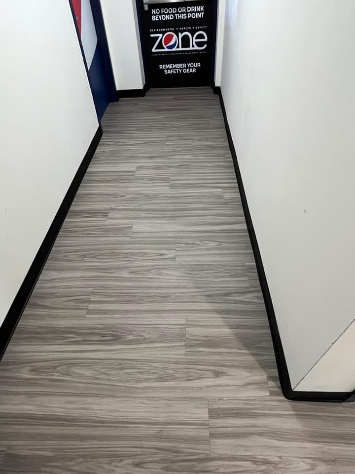 Matte wooden floors in hallway
