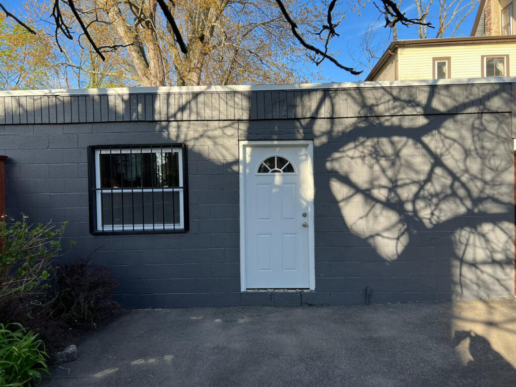 Grey exterior garage walls after painting