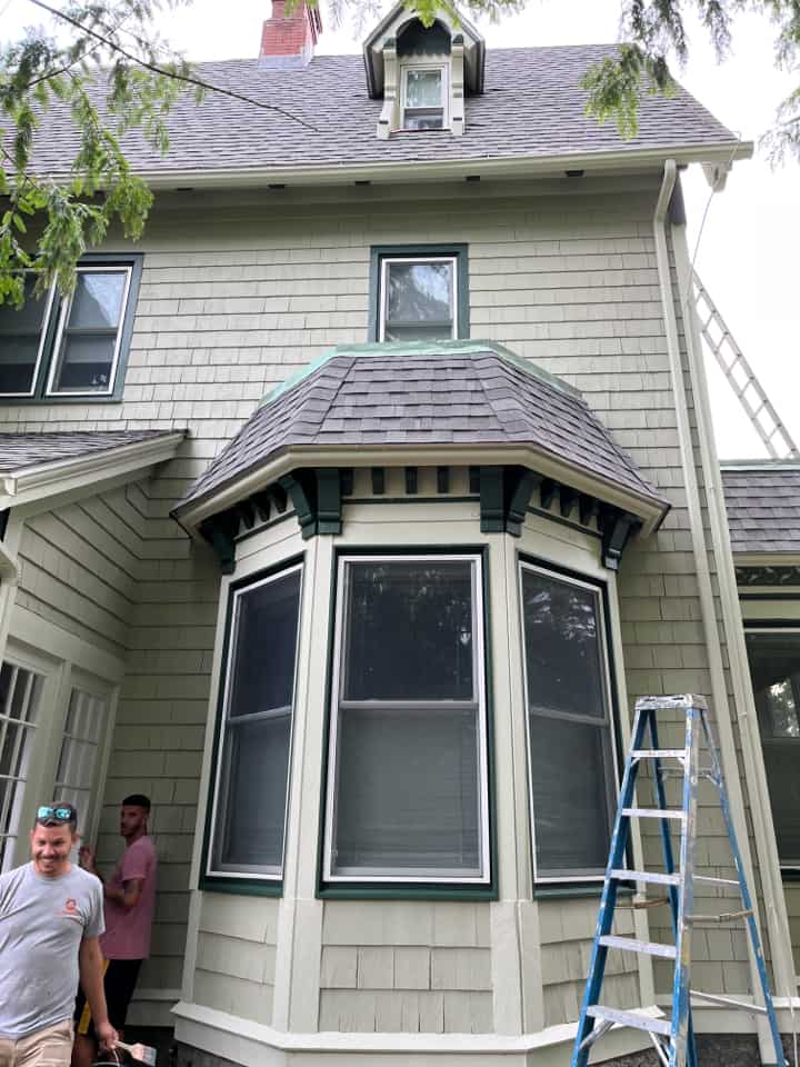 Painters working on home exterior