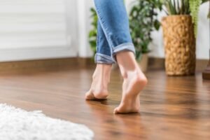 Woman standing on hardwood floor