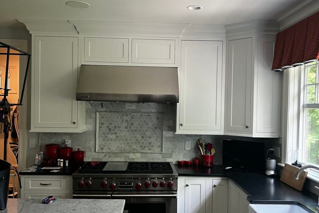 Wellesley interior refresh with hardwood floor and cabinet refinishing